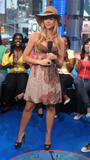 Denise Richards shows cleavage at MTV’s Total Request Live