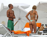 Mena Suvari showing her ass in thong bikini at beach in Miami Beach