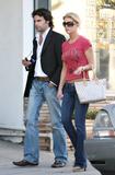 Tara Reid in red tees