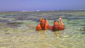 Topless blonde babe and her friend on beach-04ewvnaftl.jpg