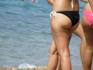 Greek-Beach-Candid-Voyeur-Bikini-2009--r4g8f2fqqr.jpg