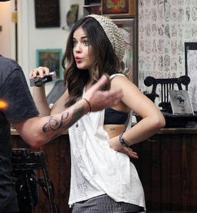 http://img102.imagevenue.com/loc577/th_587077572_LucyHale_ShamrockTattooCandids_September9_2012_14_122_577lo.jpg