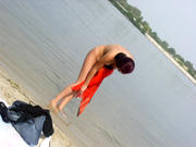 Nude-girl-posing-on-the-beach-f38v3htbdy.jpg
